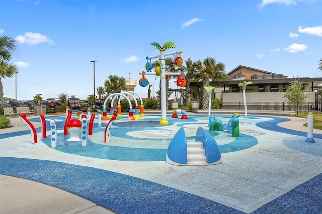 surrounding community featuring playground community and fence