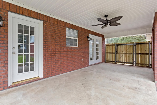 view of patio featuring a gate and ceiling fan