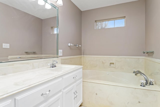 full bathroom with a bath and vanity