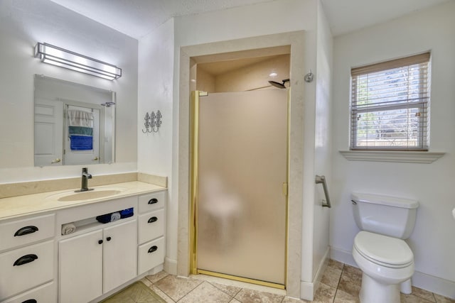 full bath featuring baseboards, toilet, a stall shower, and vanity