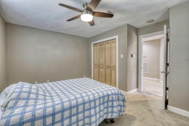 bedroom with visible vents, baseboards, and carpet floors