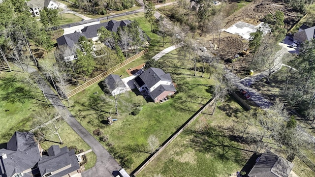 birds eye view of property with a residential view