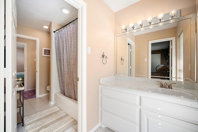 full bathroom featuring shower / bath combination with curtain, toilet, vanity, tile patterned flooring, and baseboards