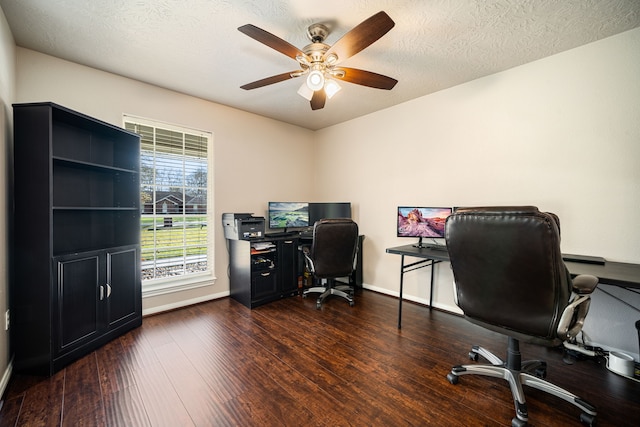 office space with ceiling fan, a textured ceiling, baseboards, and hardwood / wood-style floors