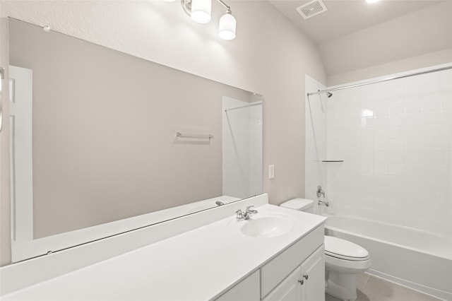 bathroom with visible vents, toilet, tile patterned flooring, tub / shower combination, and vanity