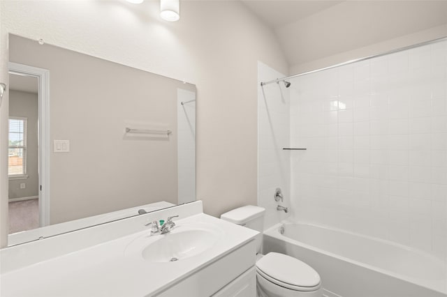 full bathroom featuring toilet, washtub / shower combination, and vanity