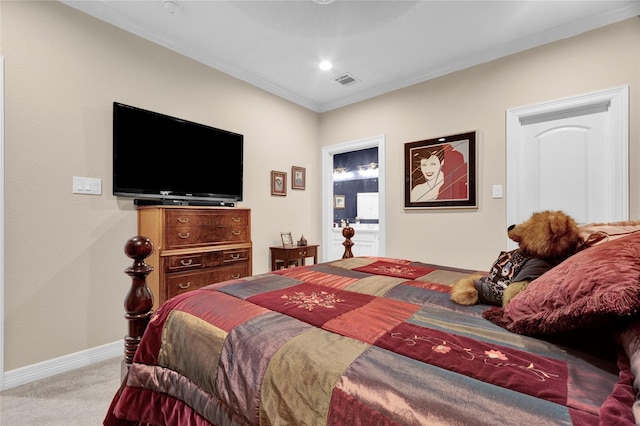 carpeted bedroom with recessed lighting, visible vents, baseboards, ornamental molding, and ensuite bath