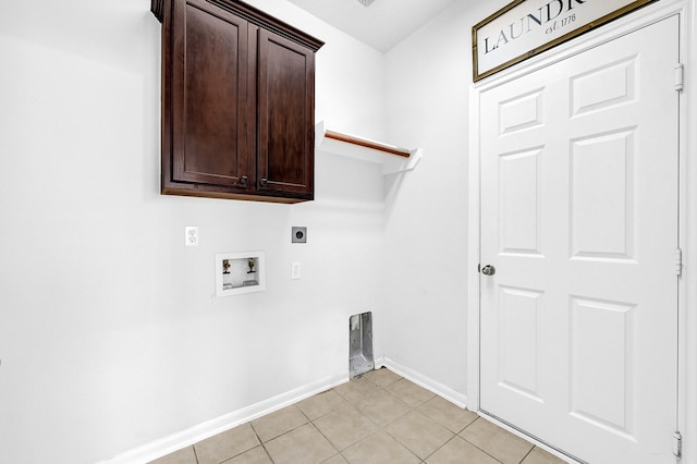 3520 White Oak Point Dr, Conroe, TX 77304 - laundry room featuring cabinet space, light tile patterned floors, baseboards, hookup for an electric dryer, and hookup for a washing machine