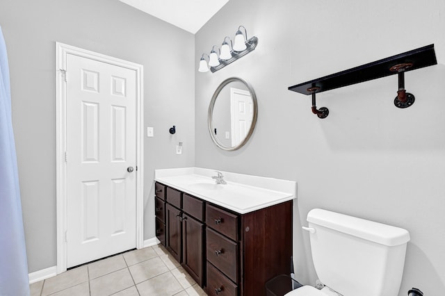 3520 White Oak Point Dr, Conroe, TX 77304 - bathroom featuring tile patterned floors, toilet, vanity, and baseboards