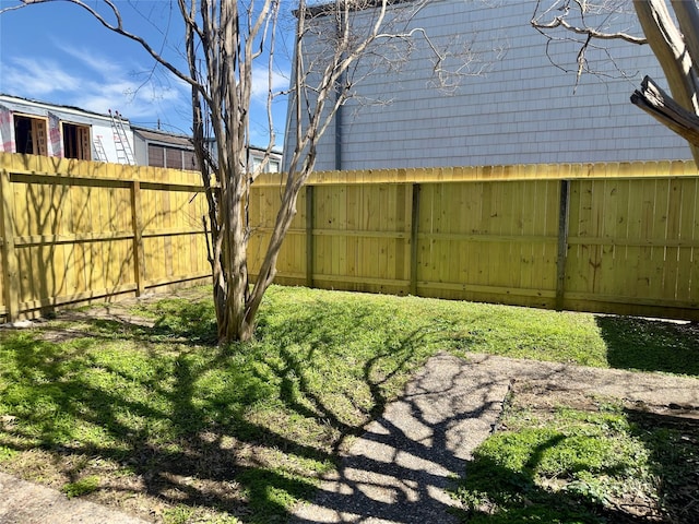 view of yard with fence