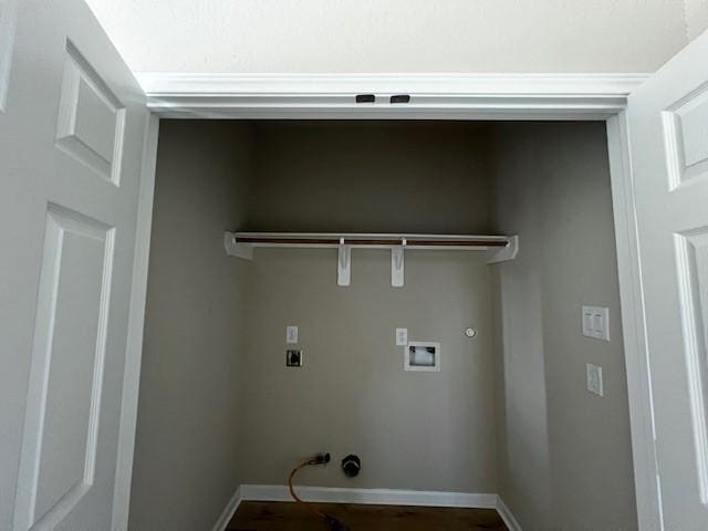 washroom with washer hookup, laundry area, hookup for a gas dryer, and baseboards