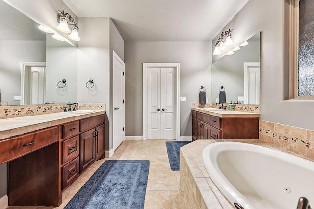 full bathroom featuring double vanity, a sink, baseboards, and a bath