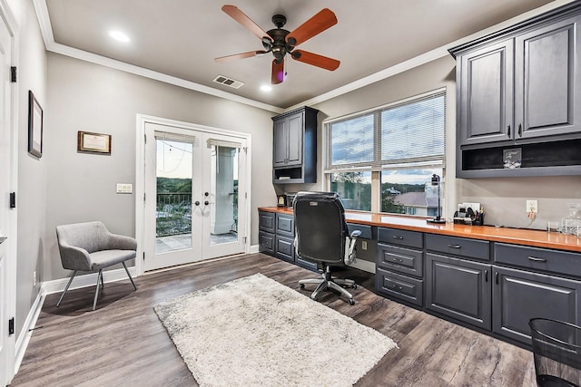 office with baseboards, dark wood finished floors, built in study area, and french doors