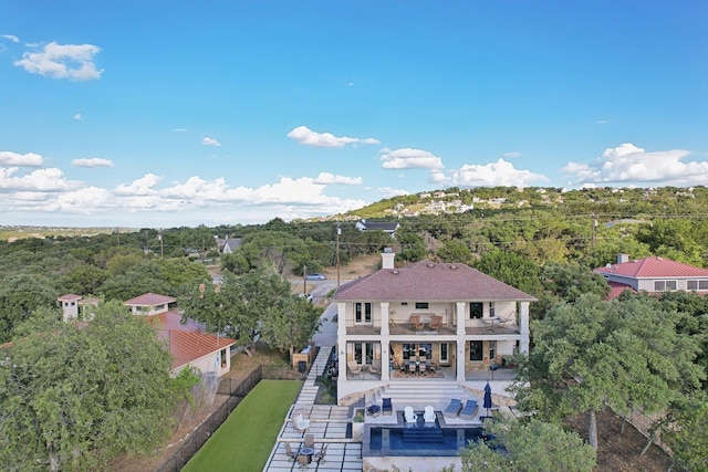 bird's eye view featuring a view of trees