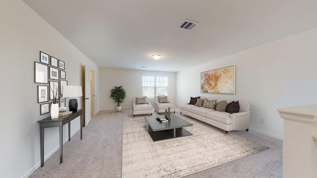 carpeted living area with baseboards and visible vents