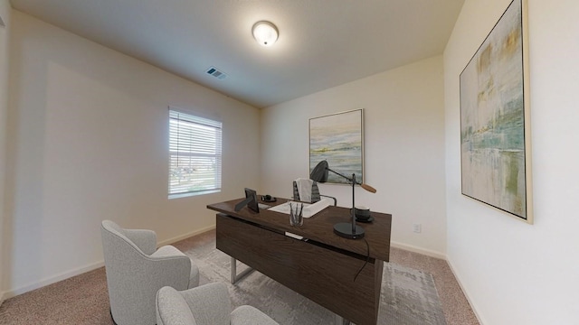 office with light colored carpet, visible vents, and baseboards