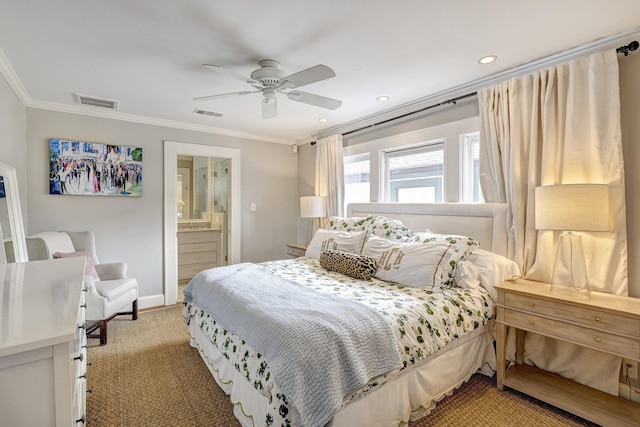 bedroom featuring recessed lighting, visible vents, crown molding, and ensuite bath