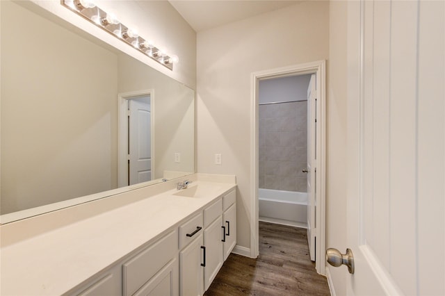 full bath featuring wood finished floors and vanity