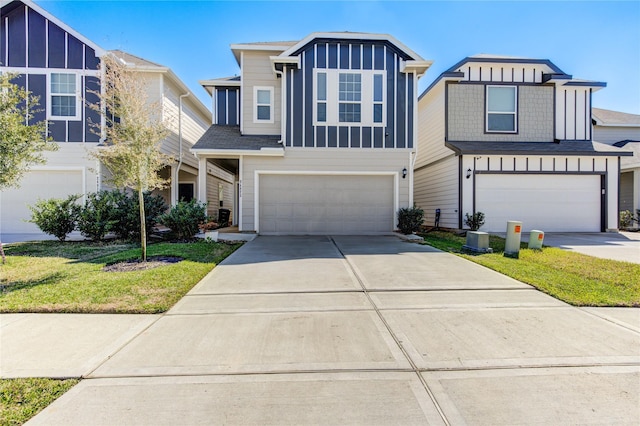 view of front of home featuring a garage, driveway, and board and batten siding