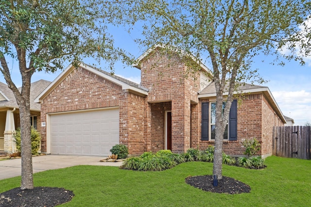 view of front of house featuring a garage, a front yard, concrete driveway, and brick siding