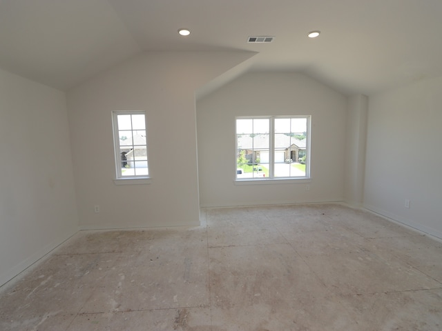 22427 Birchfield Grove Ln, New Caney, TX 77357 - bonus room featuring plenty of natural light, vaulted ceiling, recessed lighting, and baseboards