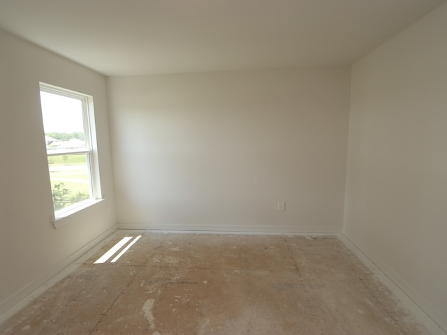 22427 Birchfield Grove Ln, New Caney, TX 77357 - empty room featuring baseboards