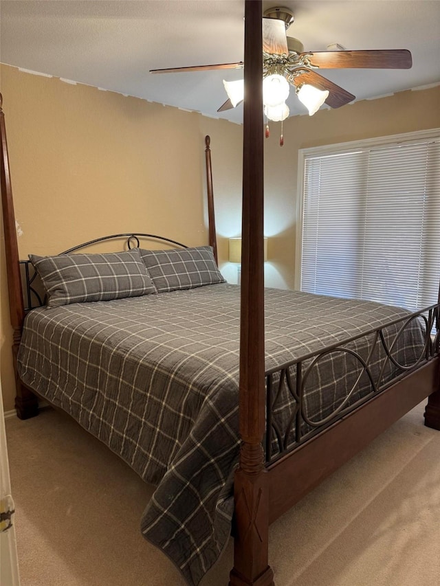 bedroom with carpet flooring and ceiling fan