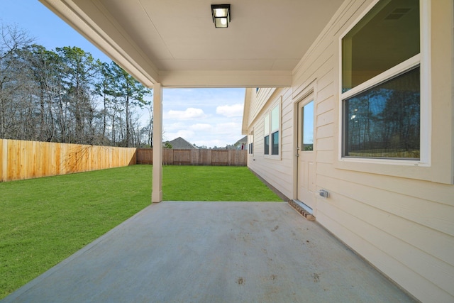 view of patio with a fenced backyard