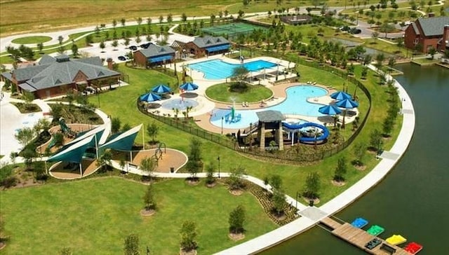 11435 Desert Orangetip Way, Cypress, TX 77433 - bird's eye view of a pool and a nearby body of water