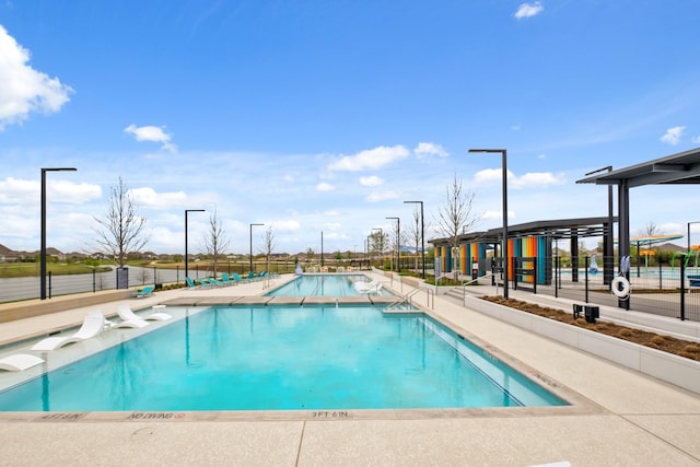 11435 Desert Orangetip Way, Cypress, TX 77433 - community pool featuring fence and a patio