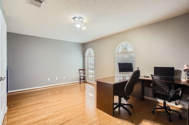811 Piney Ridge Dr, Friendswood, TX 77546 - office area with wood finished floors and baseboards
