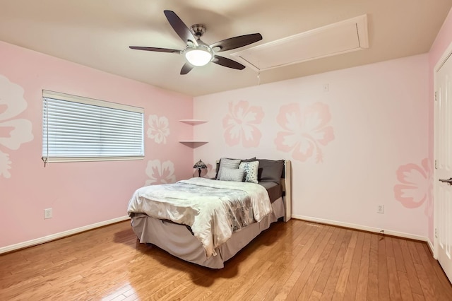 811 Piney Ridge Dr, Friendswood, TX 77546 - bedroom featuring attic access, light wood-style floors, and ceiling fan