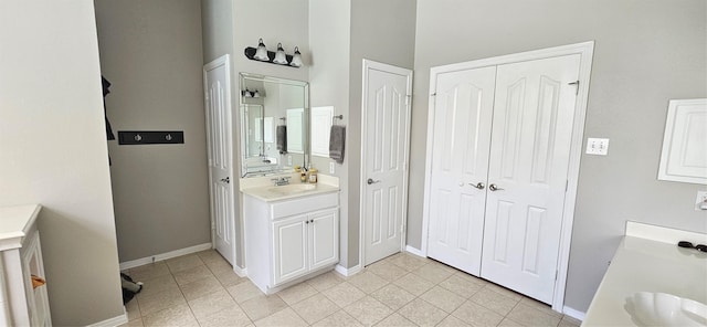 811 Piney Ridge Dr, Friendswood, TX 77546 - full bathroom with a closet, vanity, and tile patterned flooring
