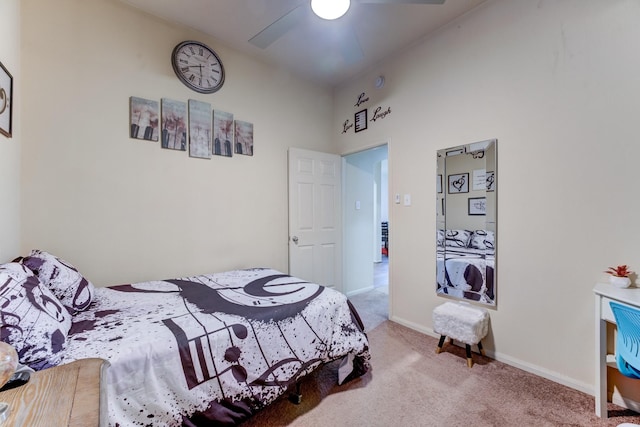 bedroom featuring ceiling fan, carpet, and baseboards