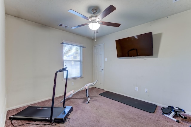 exercise room featuring a ceiling fan, carpet flooring, visible vents, and baseboards