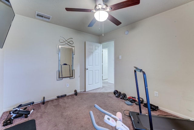 exercise room with ceiling fan, carpet, visible vents, and baseboards