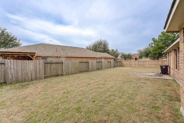 view of yard featuring a fenced backyard