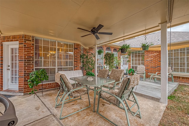 view of patio / terrace featuring outdoor dining area and ceiling fan