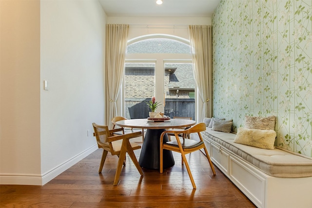 dining room with recessed lighting, baseboards, dark wood-style flooring, and wallpapered walls