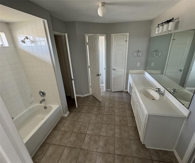 full bathroom featuring baseboards, vanity, shower / bathtub combination, and tile patterned floors