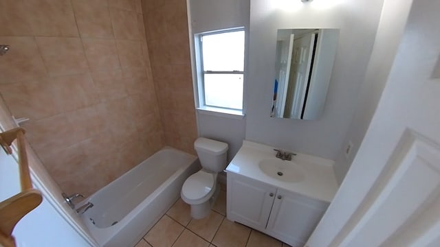 bathroom featuring toilet, tile patterned flooring, shower / bathing tub combination, and vanity