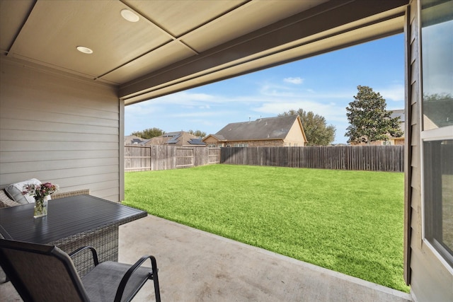 view of yard with a patio area and a fenced backyard