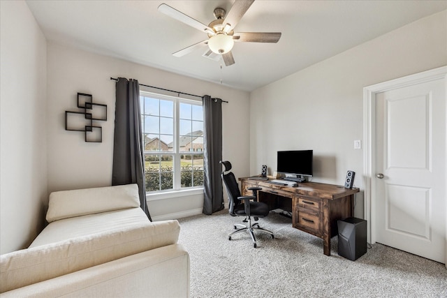 office space featuring ceiling fan, carpet, and baseboards