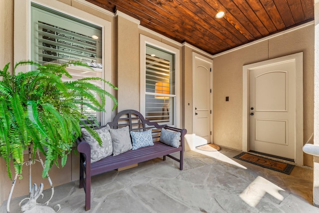 doorway to property with stucco siding