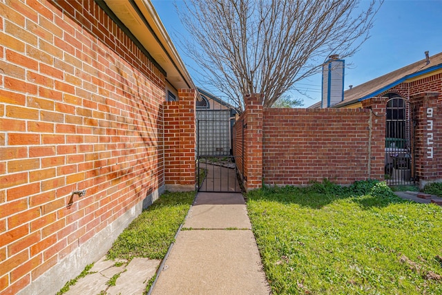 exterior space with a gate and fence