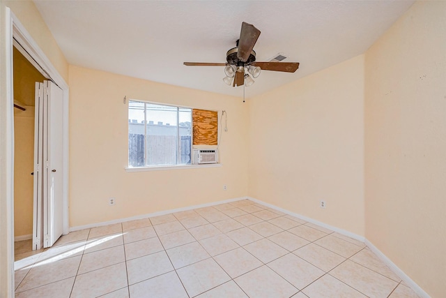 unfurnished bedroom with visible vents, baseboards, light tile patterned floors, cooling unit, and a closet