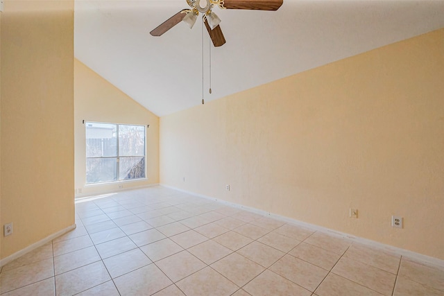 empty room with baseboards, high vaulted ceiling, light tile patterned flooring, and a ceiling fan