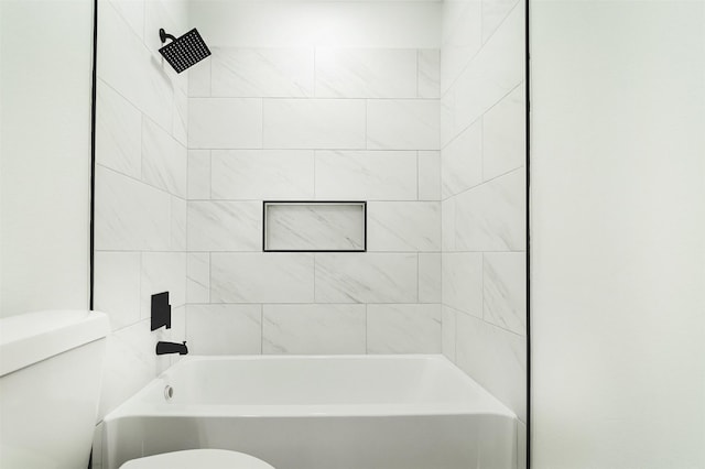 bathroom with toilet and shower / tub combination