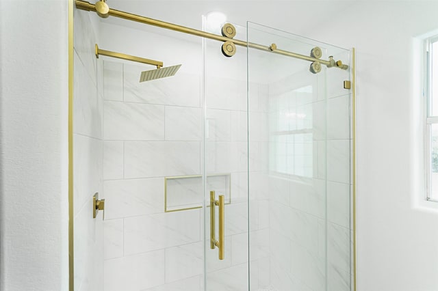 full bath featuring a stall shower