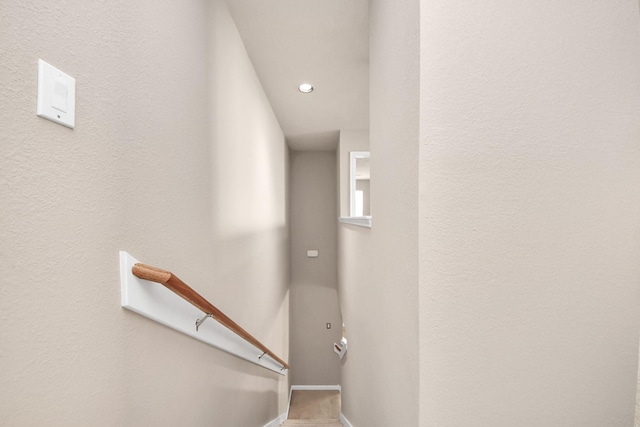 stairway with baseboards